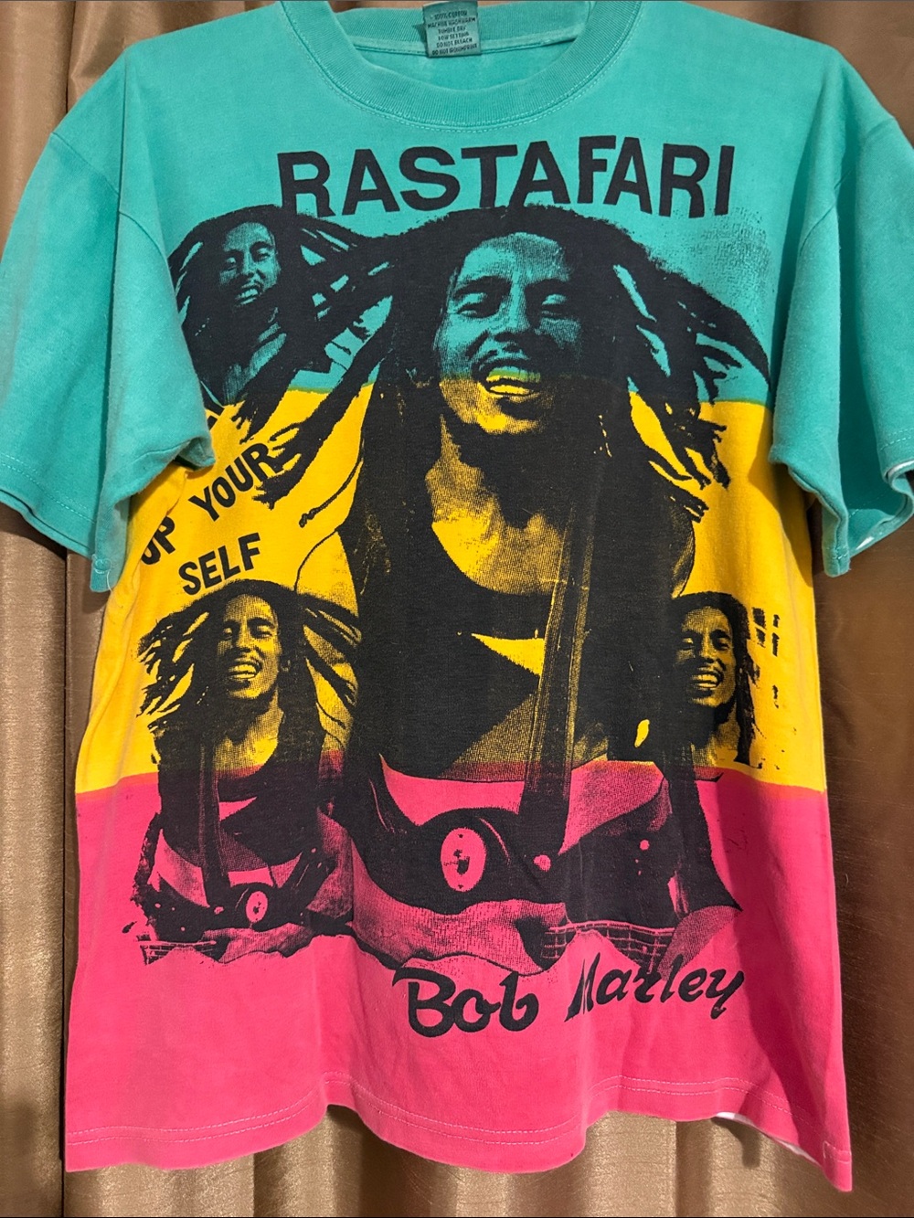 Vintage 1990’s Bob Marley "Rastafari" colorblock shirt on a "Jamaican Tees" Tag